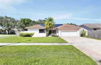 Corner lot with long driveway.