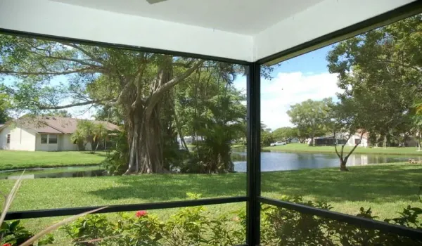 Enjoy your screened lanai over looking the lake