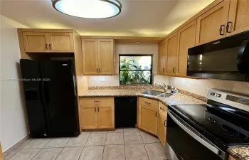 Custom lighting and cabinetry in kitchen