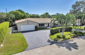 Blue skies all year long!  This home is well manicured from every angle!