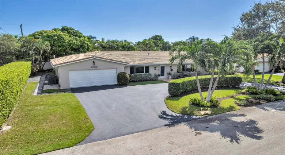 Blue skies all year long!  This home is well manicured from every angle!