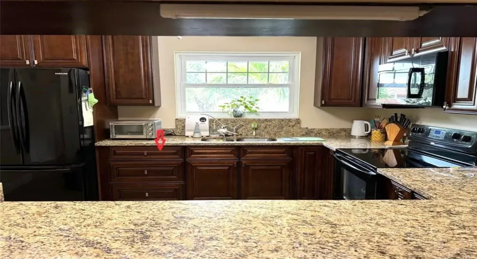 The Cabinet Next To The Refrigerator Is Separate And Not Attached To The Cabinet To The Right. The Seller Is Willing To Remove The Existing Cabinet And Install A New Dishwasher Prior To Closing.