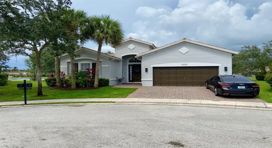 Lakefront home is nestled on a safe cul-de-sac.