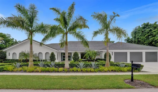 Welcome to 2674 NW 29th Drive!  This Spectacular Corner Lot Estate Features An Oversized 3 Car Garage (The Oversized Interior Garage is 950 sq ft) + Oversized Circular Driveway + All New Professional Landscaping Throughout...