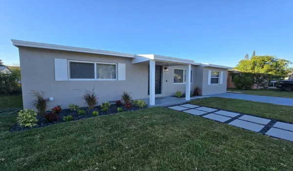 Front of Home with New Walkway, Sod, Landscaping & Sprinkler System (2024)