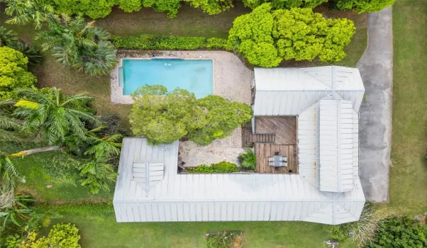 AERIAL VIEW  ALL PATIO'S AND LIVING AREA WRAPS AROUND PAVERED POOL COURTYARD THE PHOTOS DO NOT PICK UP THE VIBE OF THIS ORGANIC SPACE 5 ACRE PARCEL