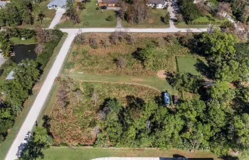 This appx. 2.5 acre lot has been cleared and is fenced. 159 CT is on the top of the photo, Alexander Run is three parcels to the east. 121 TE on the left