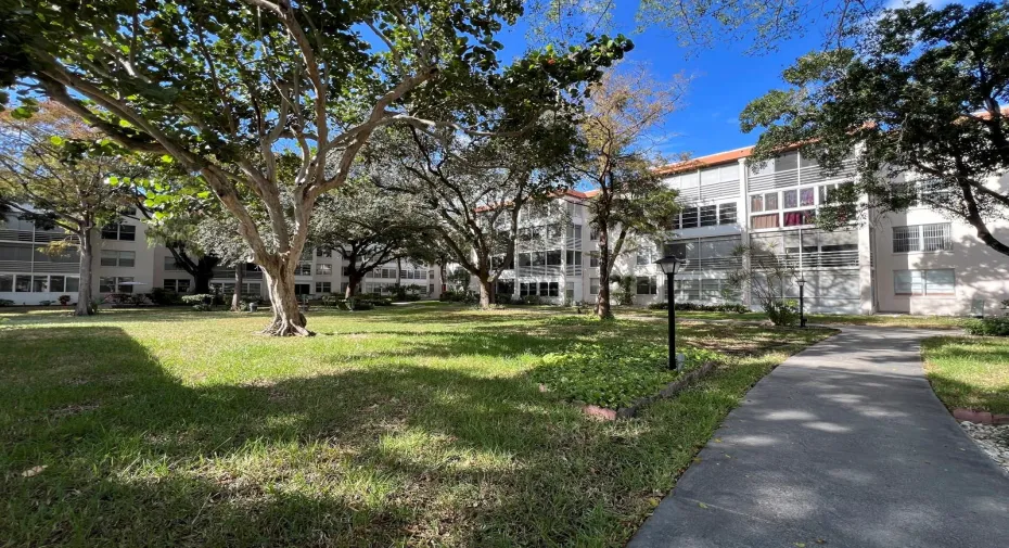 Your new home or vacation condo!  Stroll the beautiful grounds on this walking path.