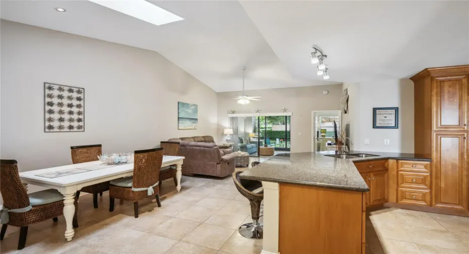 Open kitchen and skylight allow for optimized living space and natural light.