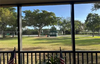 View of Country Club Dr from screened patio