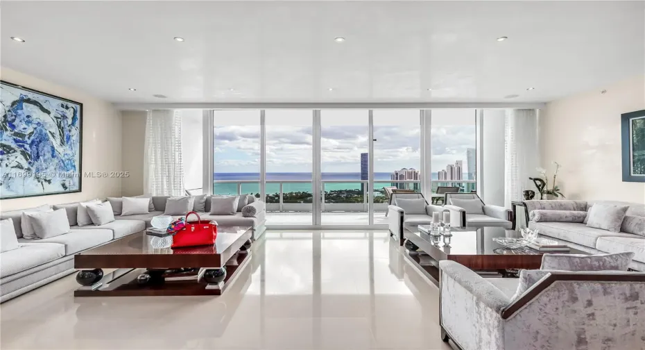 Living room: Oversized, and comfortable.  High cielings and well kept marble floors