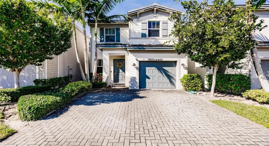 Inviting Exterior Front-Oversized Driveway.