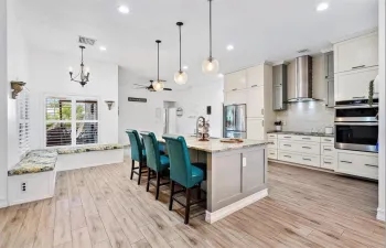 Gorgeous Open Kitchen with ~10ft Island, Stainless Steel Appliances, Bay Window with Plantation Shutters.
Vaulted 10