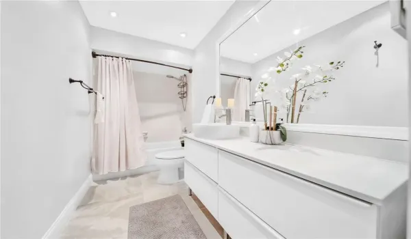 New bathroom floors, vanity with plenty of extra storage