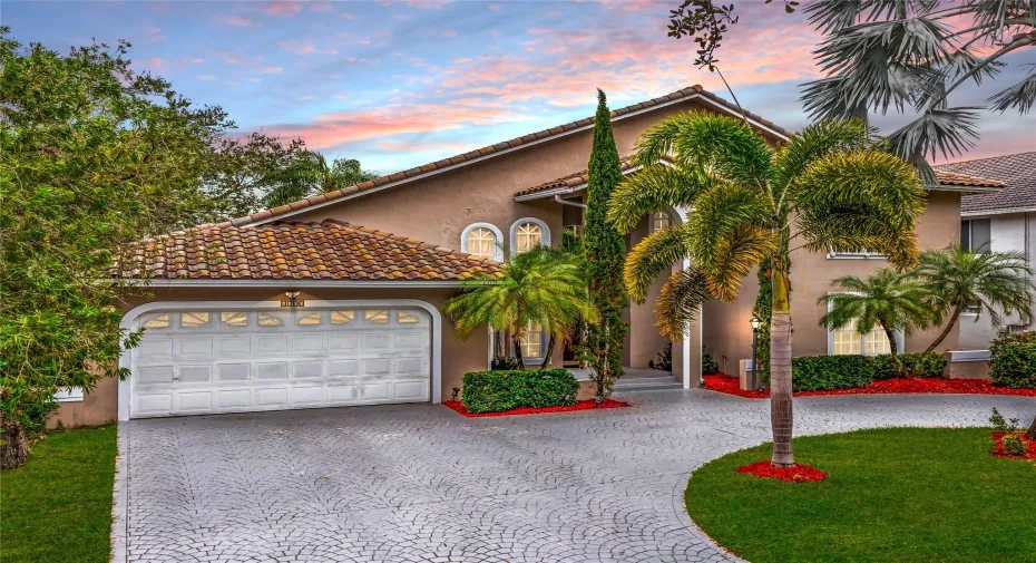 TWILIGHT FRONT WITH CIRCULAR DRIVEWAY