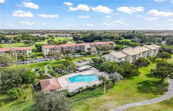 Resort style living awaits in this newly updated Century Village condo that's ensconced in this freshly painted building with its sparkling private pool and scenic golf course - Welcome Home!