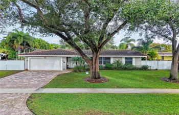 Welcome Home! NO HOA, quiet oak lined streets with sidewalks, Impact windows and doors+++