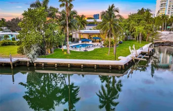 134-feet of waterfront on oversized 1/3-acre interior point lot, Breathtaking waterway views (day and night), boat lift with ocean access 5 mins to the inlet!