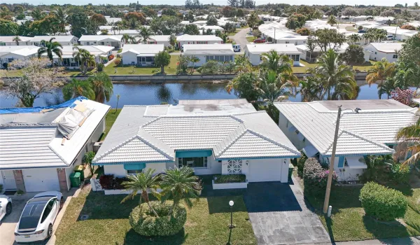 WATERFRONT-- 55 + COMMUNITY*** 2 BEDROOM/2 BATH, 1 CAR GARAGE WITH DOUBLE WIDE DRIVEWAY