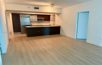 Open kitchen with new floors!