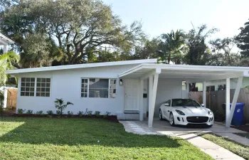 Front of home with carport