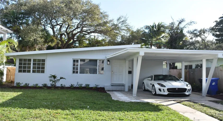 Front of home with carport