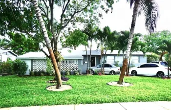 Front of house with carport