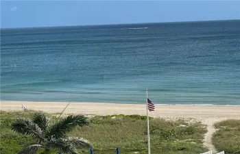 View of beach and ocean from balcony