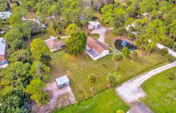 Aerial with Main House, Guest House, Barn, Storage House.