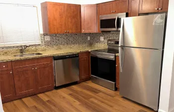 Updated kitchen, newer refrigerator and dishwasher