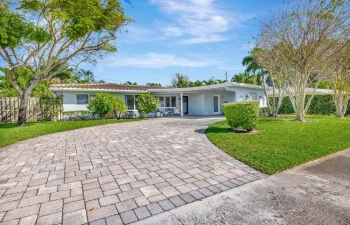 Located in Fort Lauderdale’s highly desirable Imperial Point neighborhood, this elegantly updated 3-bedroom, 2-bathroom home blends contemporary design with the relaxed charm of South Florida living.