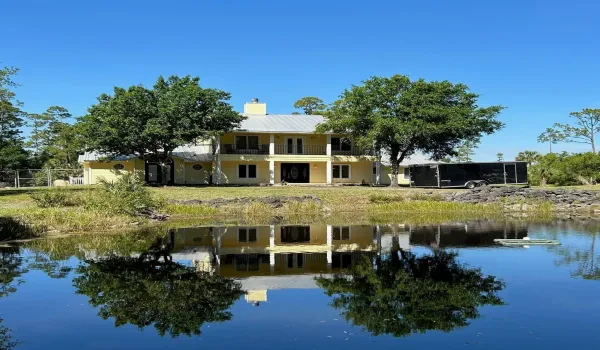Front of the home, overlooking pond