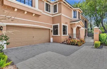 Welcome home and enter through your privately gated courtyard
