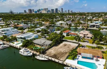 70 feet on the water in Lauderdale Harbours with downtown Fort Lauderdale in the background.
