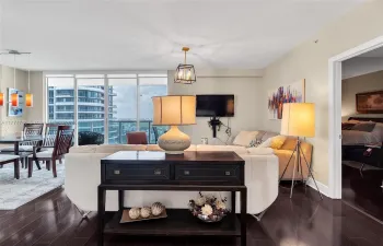 Foyer opens to open living room and dining room area