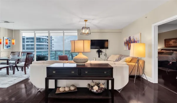Foyer opens to open living room and dining room area