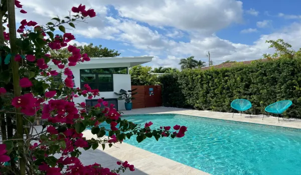 Sparkling Pool Views and Lush Tropical Courtyard with New Pool Deck