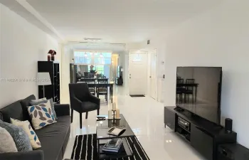 A roomy dining and living area combination.