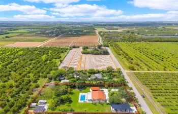  3/2 POOL W/ BARN, COVERED RV PARKING, ASSORTED FRUIT TREE'S