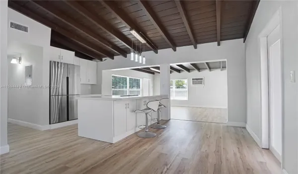 VIEW OF LIVING, KITCHEN, DINING/FLORIDA ROOMS/ OPEN CONCEPT LAYOUT